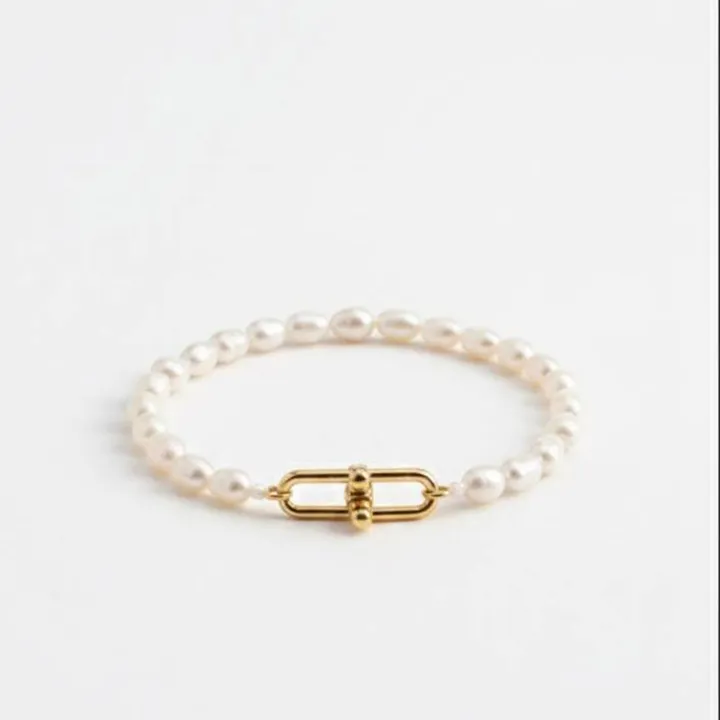 دستبند طلا زنانه کار مرواریدی طرح تیفانی